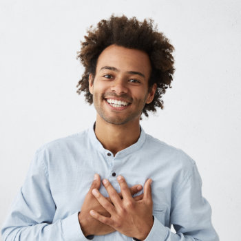 cheerful smiling young african american man