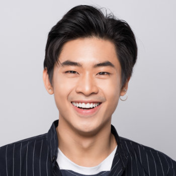 laughing young asian man with beautiful smile