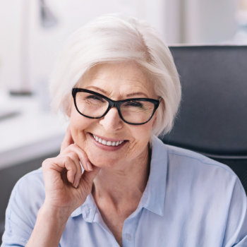 smiling senior woman in glasses