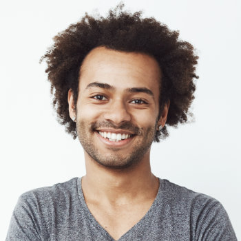 young adult spanish man with a warm smile