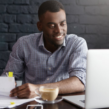 young african american businessman is using a computer