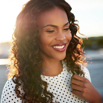 young african american woman with perfect white smile
