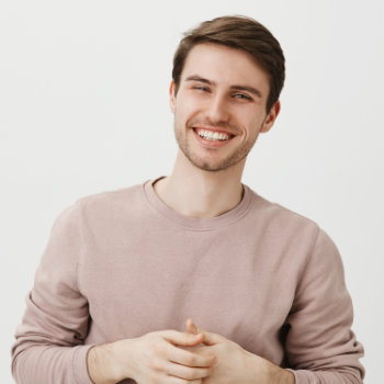 young man smiling happily